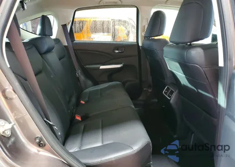 2016 Honda Cr-V Touring z USA, uszkodzony, nr VIN 5J6RM4H96GL087945